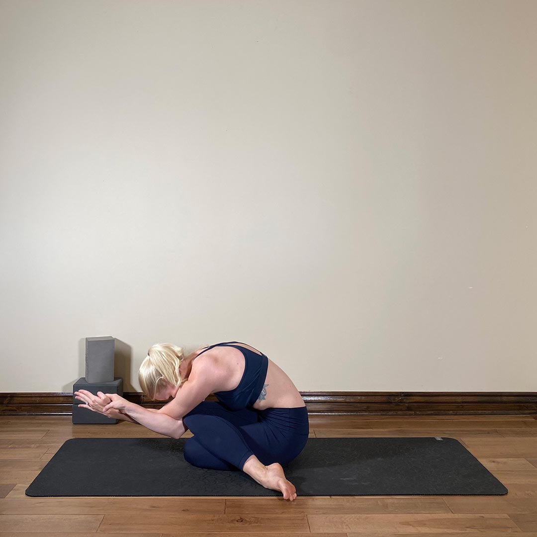 Eagle Hands in Cow Face Pose, Hasta Garudasana in Gomukasana