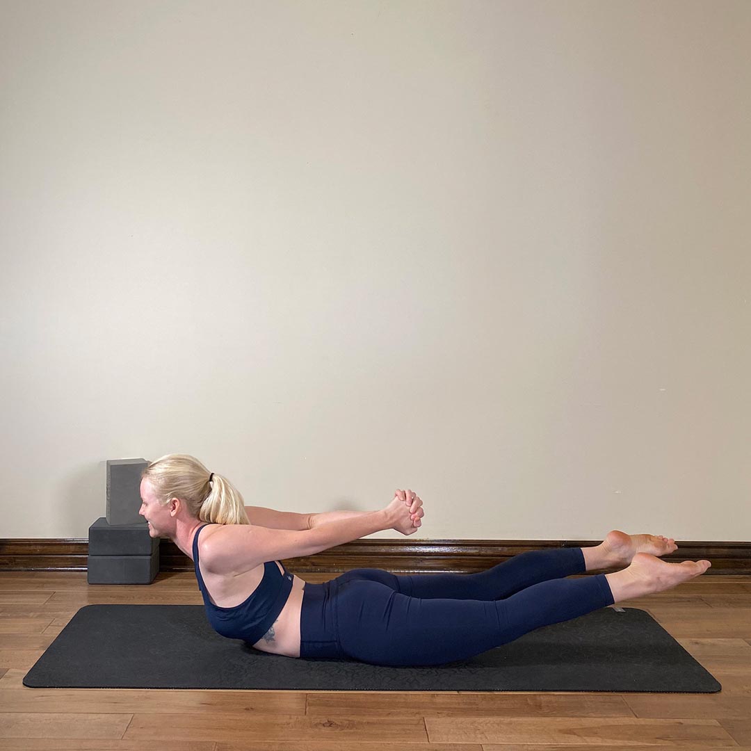 Hands Bound Locust Pose, Baddha Hasta Salambasana