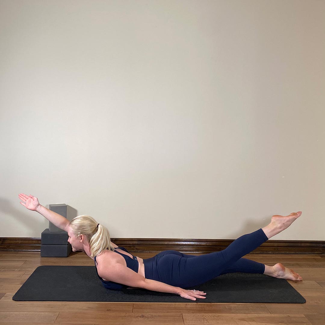Locust Pose Variation One Arm, One Leg, Salambasana