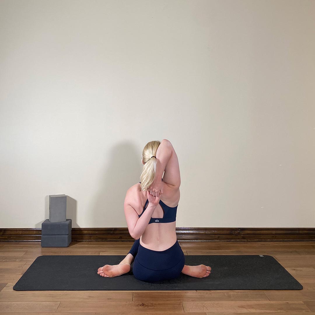 Seated Bound Cow Face Pose, Upavishta Hasta Baddha Gomukasa