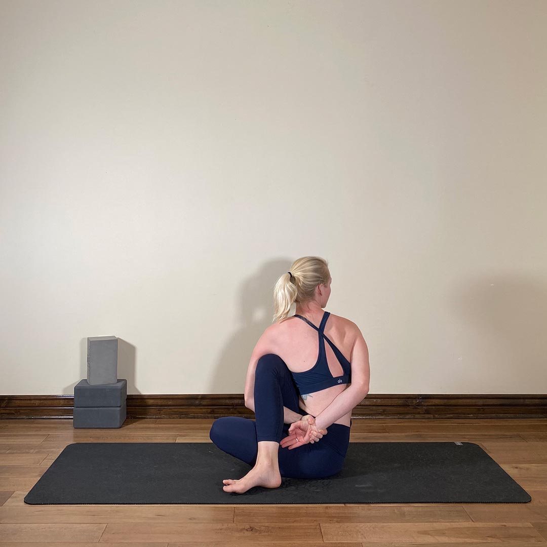 Seated Supine Twist Bound, Baddha Ardha Matsyendrasana