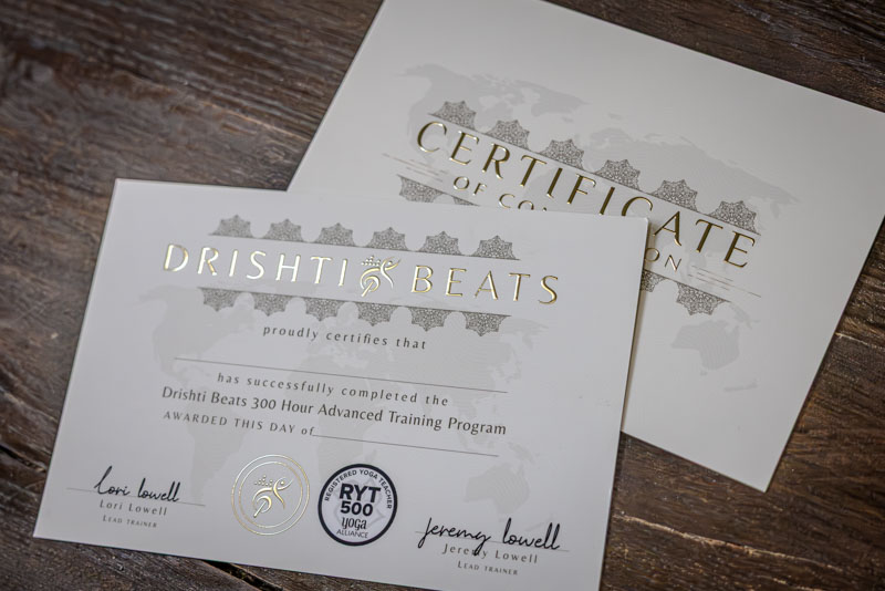 Drishti Beats 300-Hour Advanced Yoga Training certificate, gold foil on cream cardstock, signed by Lori and Jeremy Lowell
